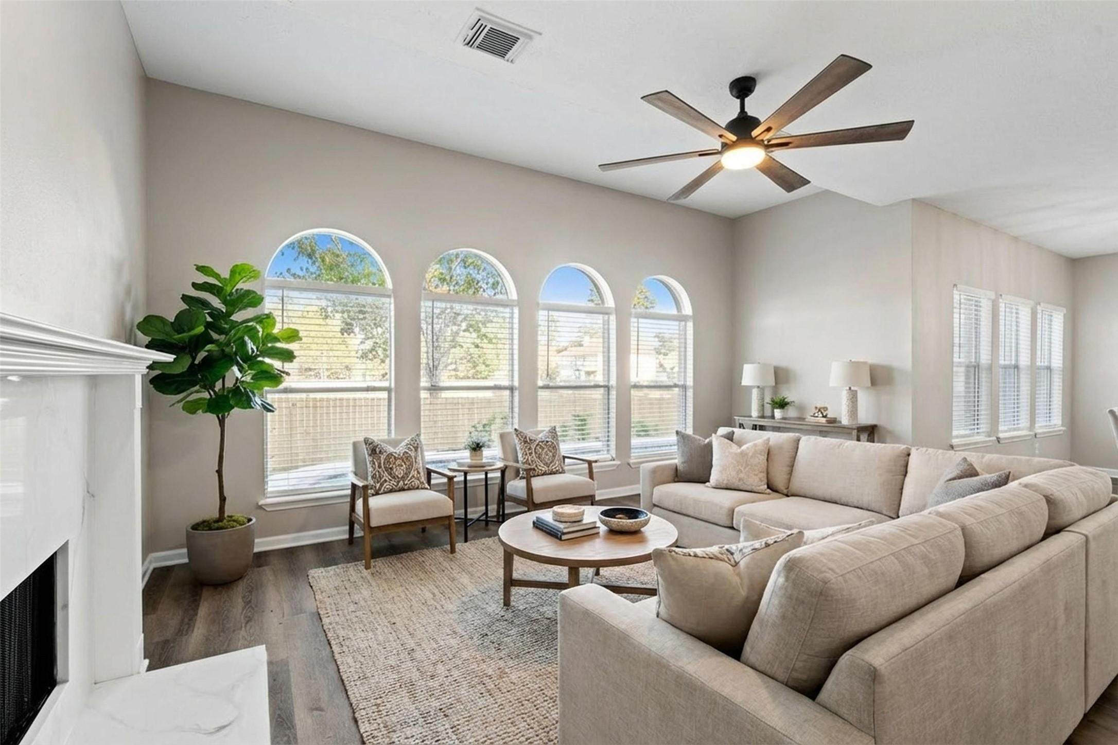 Image 3: Architectural arched windows frame views of the ba