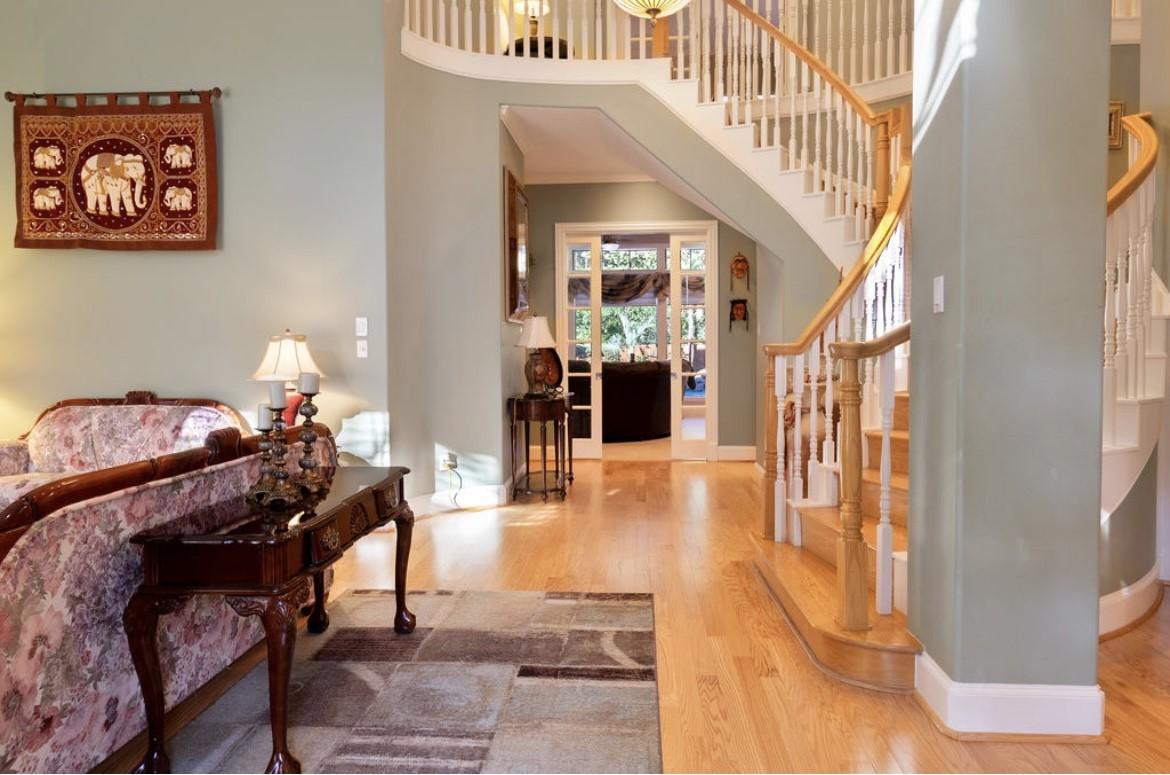 Image 3: Experience the elegant charm of this grand stairca