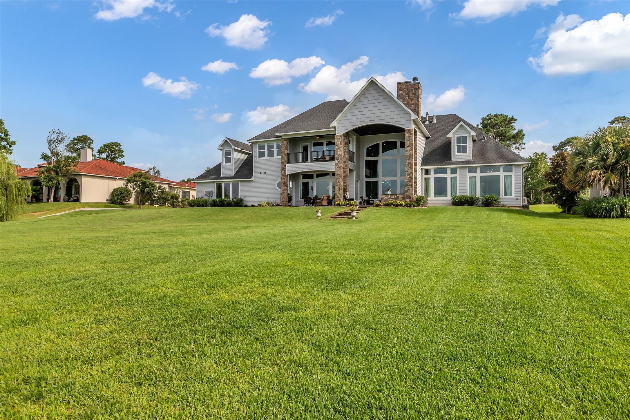 Image 2: Discover this stunning home featuring expansive wi