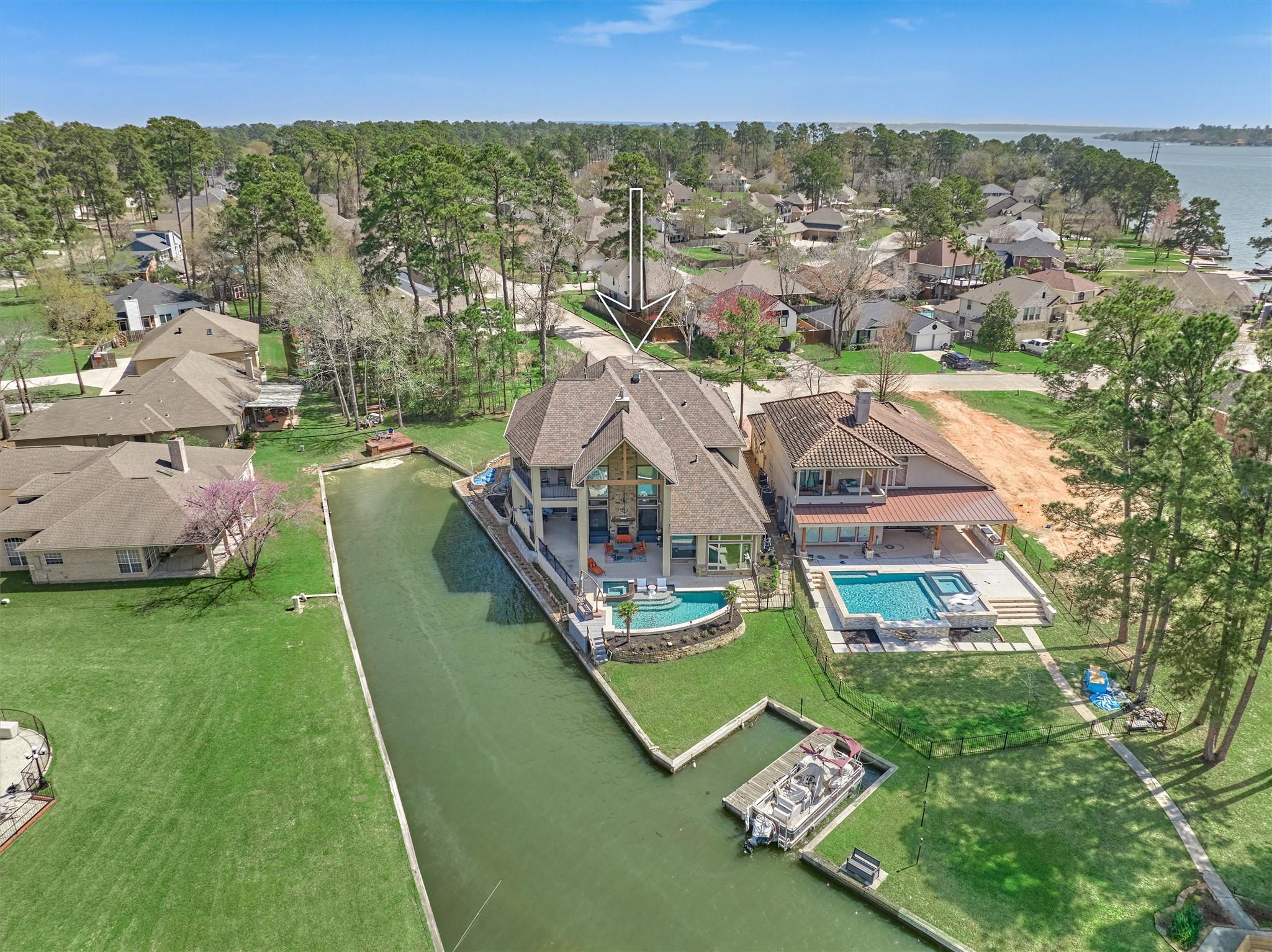 Image 4: The aerial view of this stunning home showcases it
