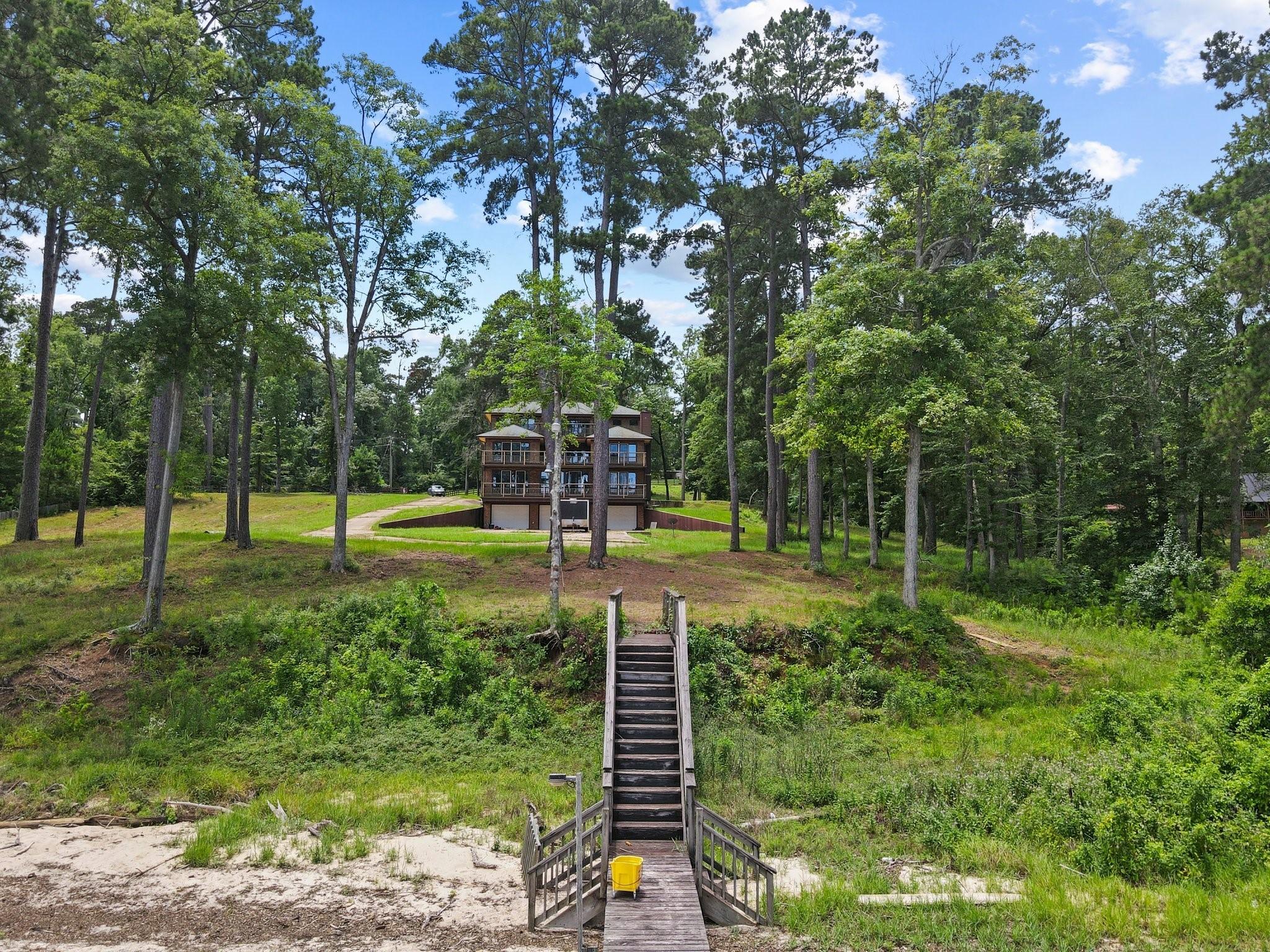 Image 3: View of the home from the boat dock