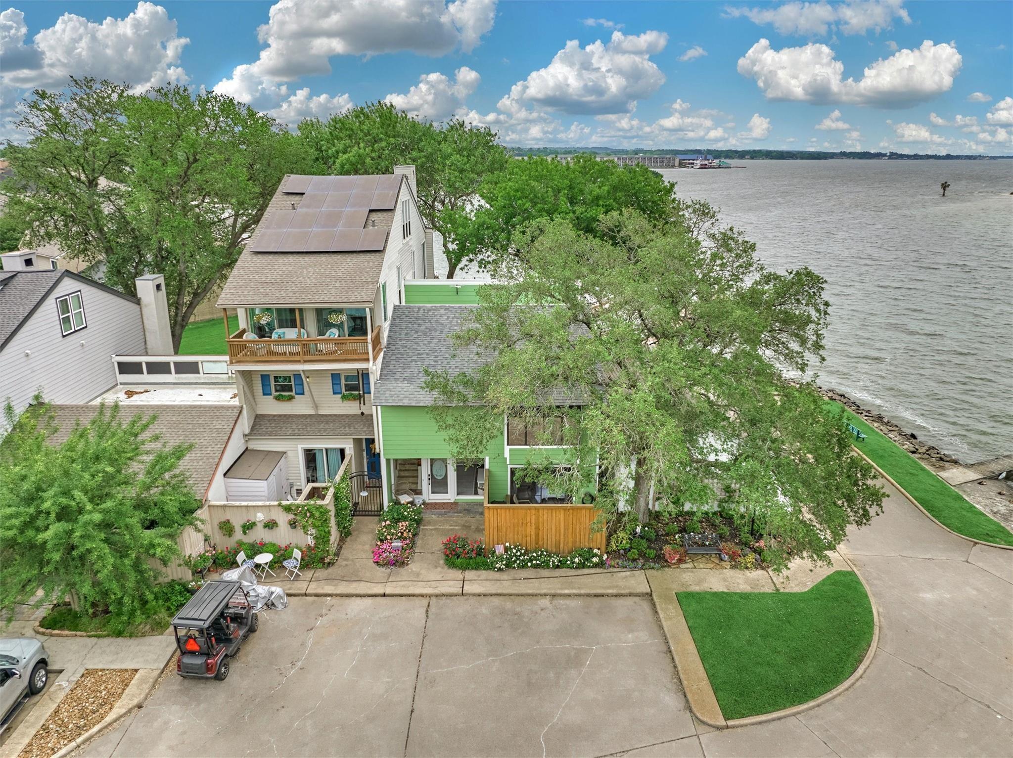 Image 4: The waterfront home captivates with its bold and c