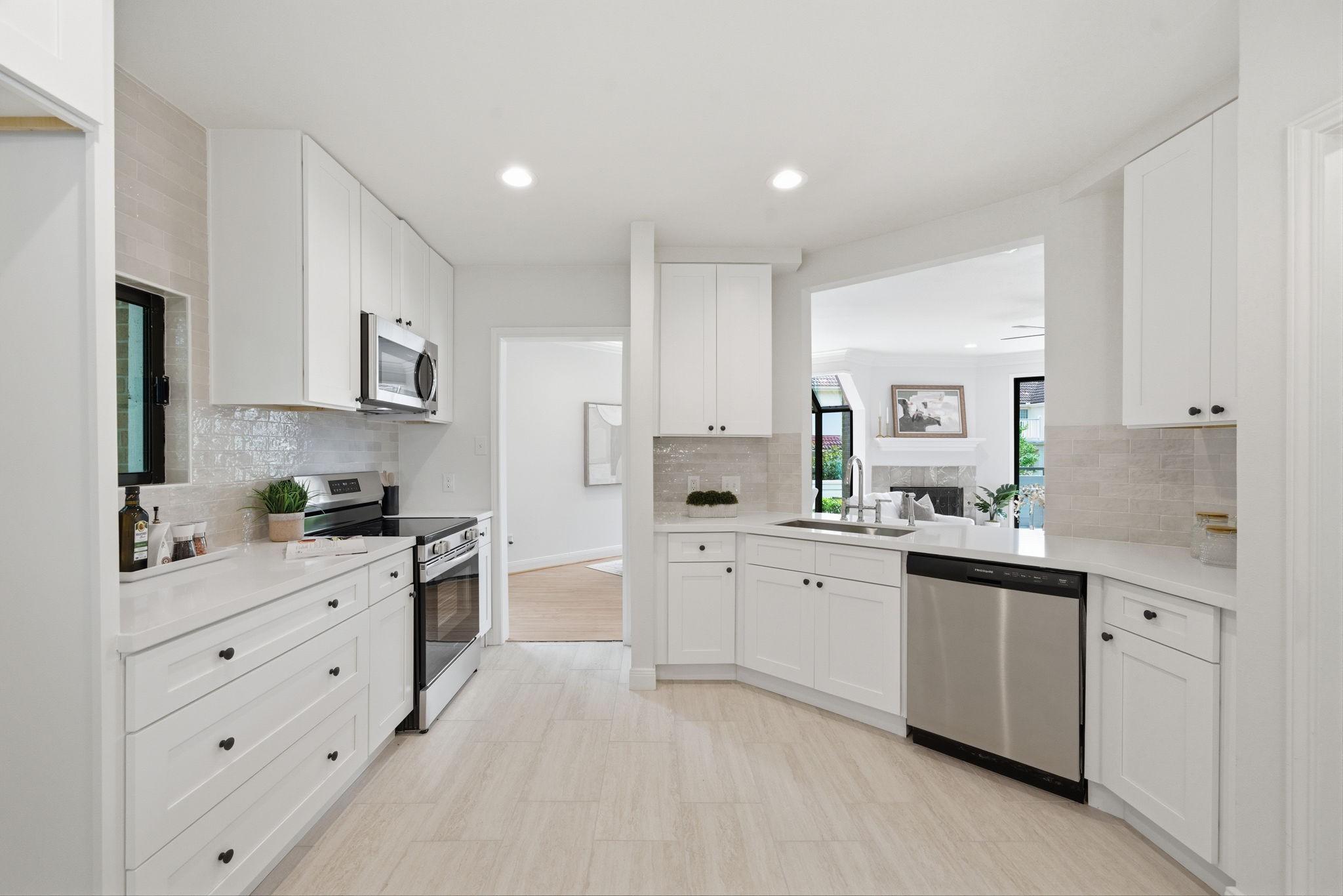 Image 1: STUNNINGLY REMODELED KITCHEN FEATURES NEW WHITE SH