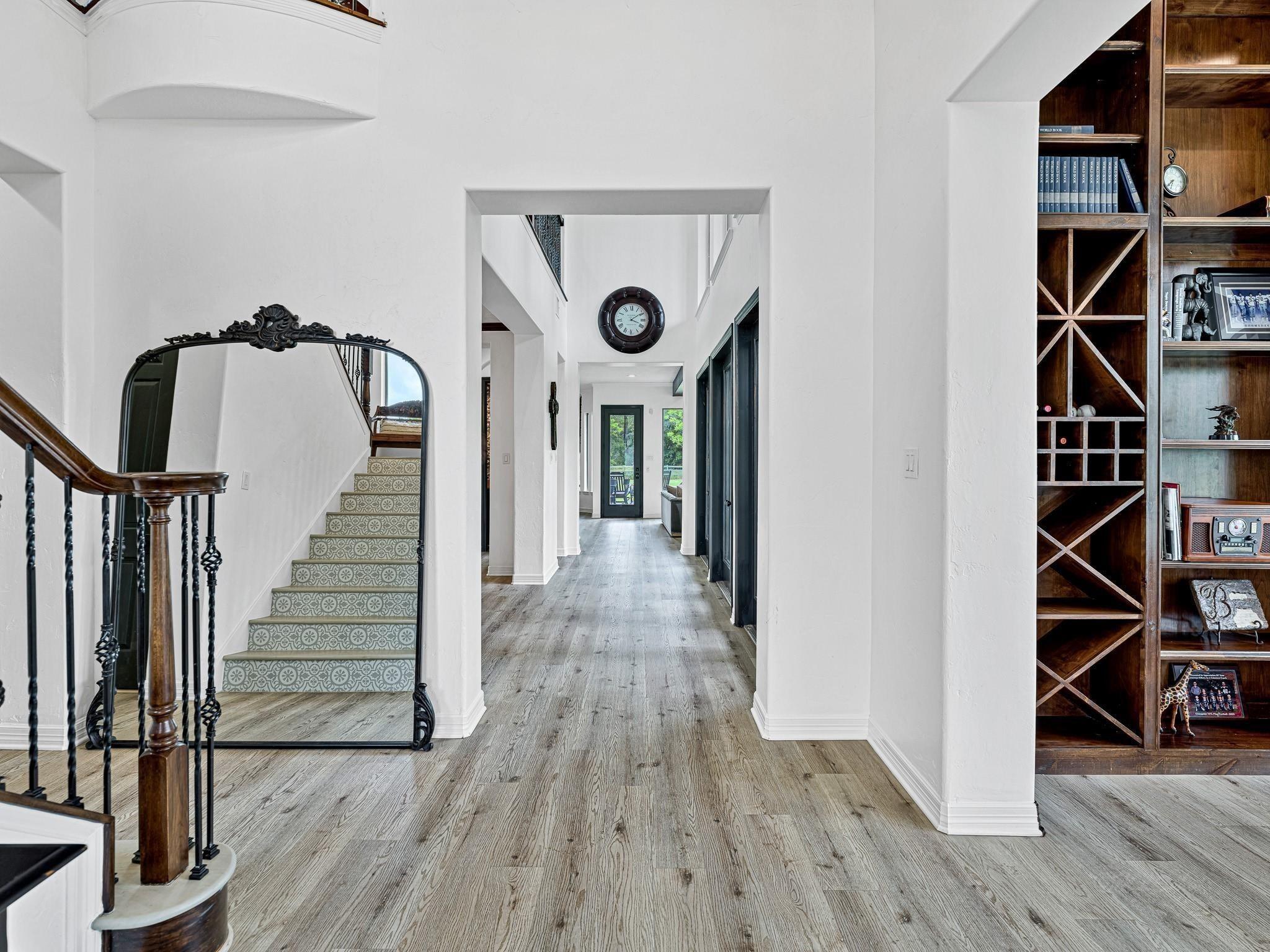 Image 4: The elegant hallway draws focus to the main entran
