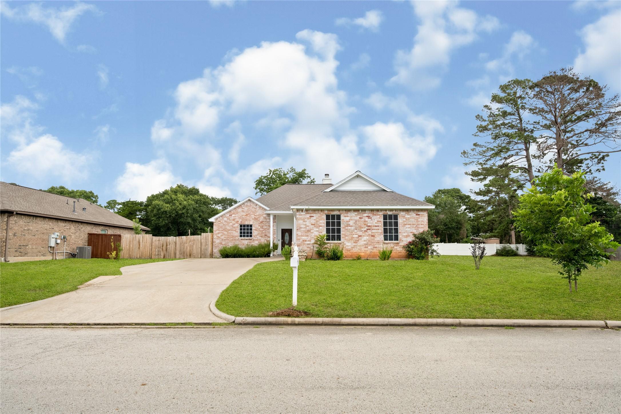 Image 2: Bright and welcoming front entryway highlighting t