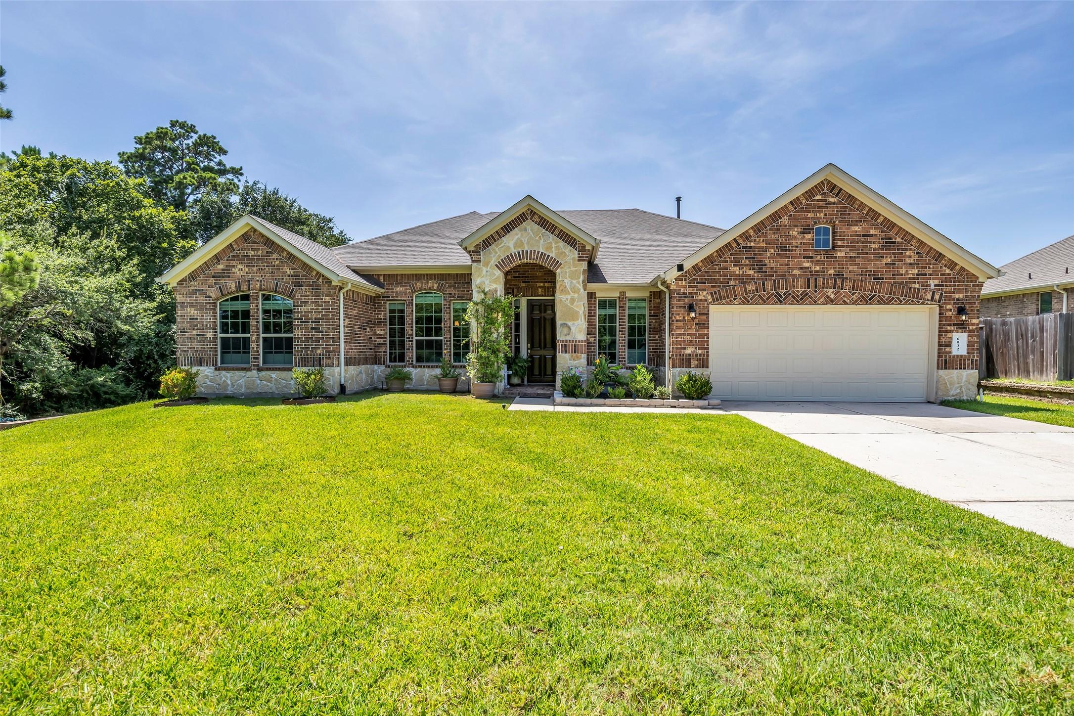 Image 1: Welcome to 6032 Calypso Ct in the small gated Encl