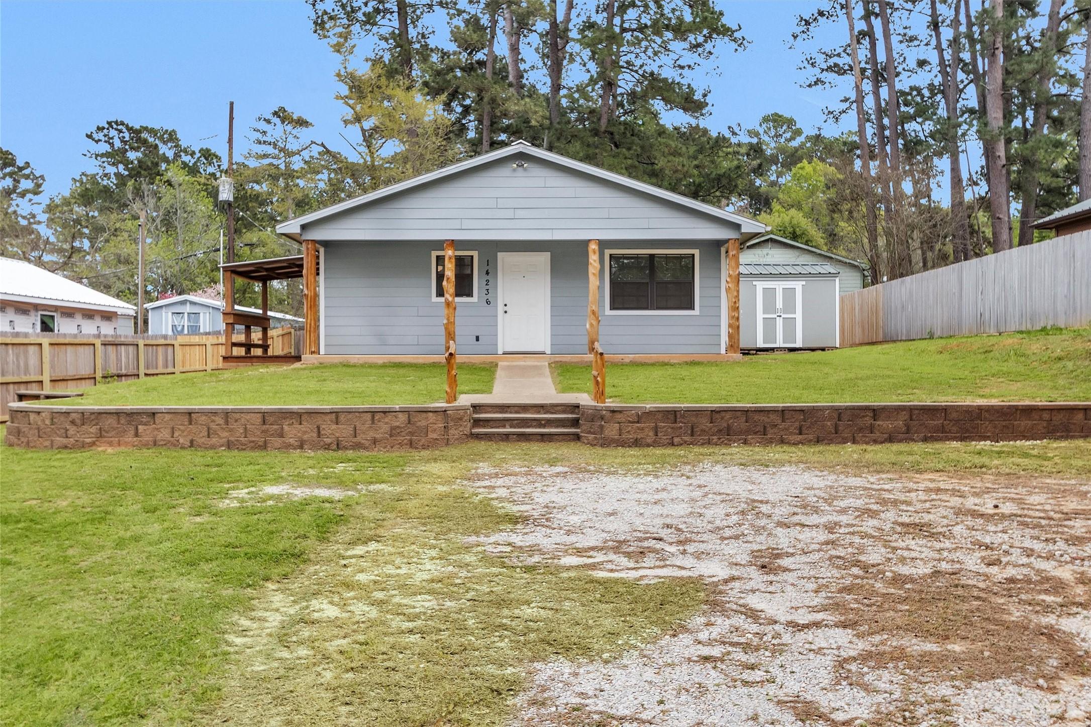 Image 4: Great view of the covered front porch, side porch