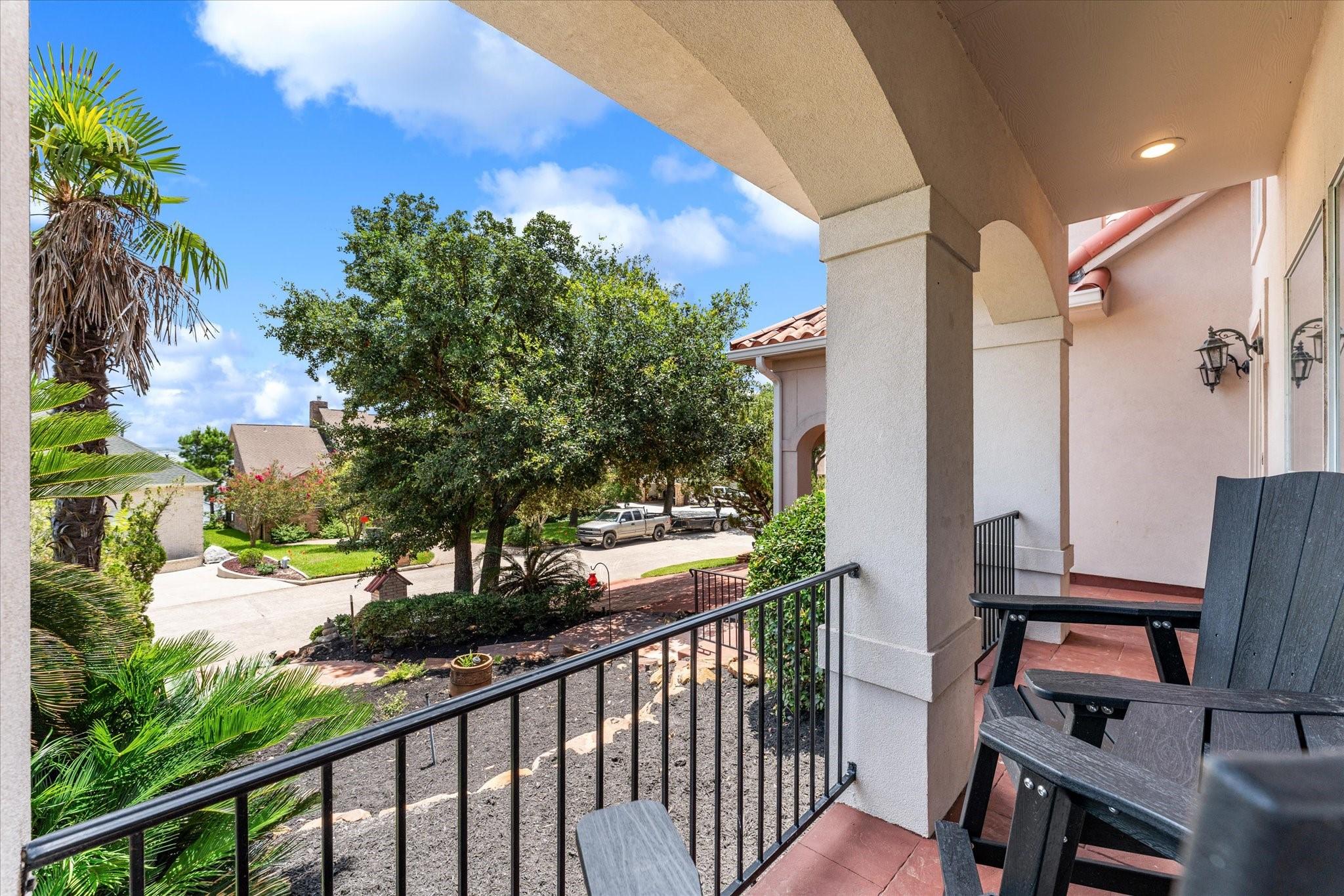 Image 4: Covered front porch perfect for sipping coffee or