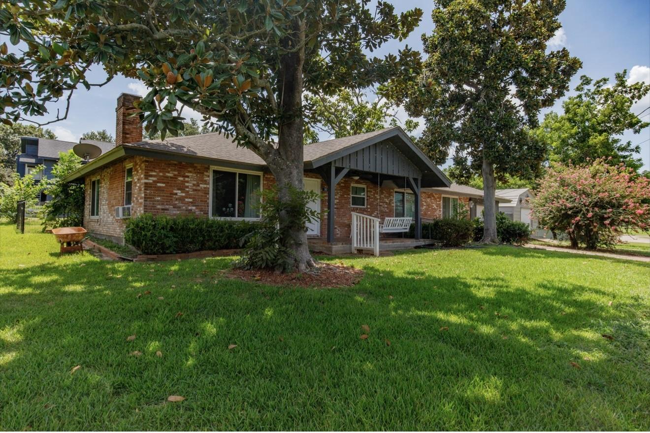 Image 1: Beautifully shaded front yard