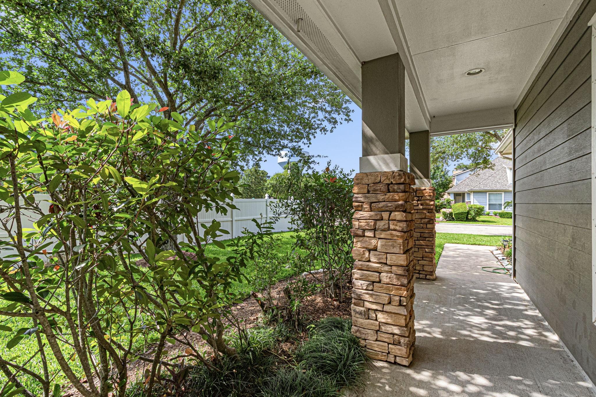 Image 4: This photo showcases a charming front porch with s