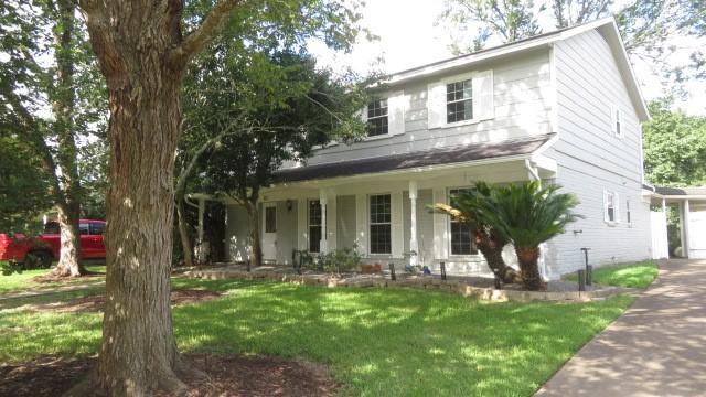 Image 2: another view of front of home