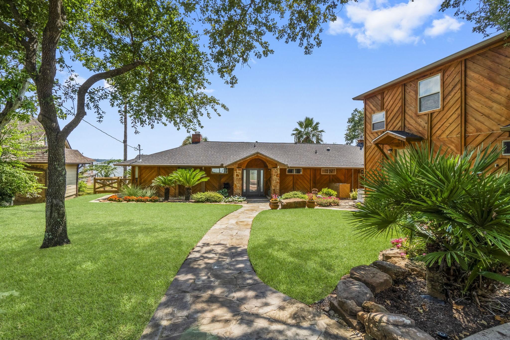 Image 3: Charming home with a rustic wooden exterior, beaut