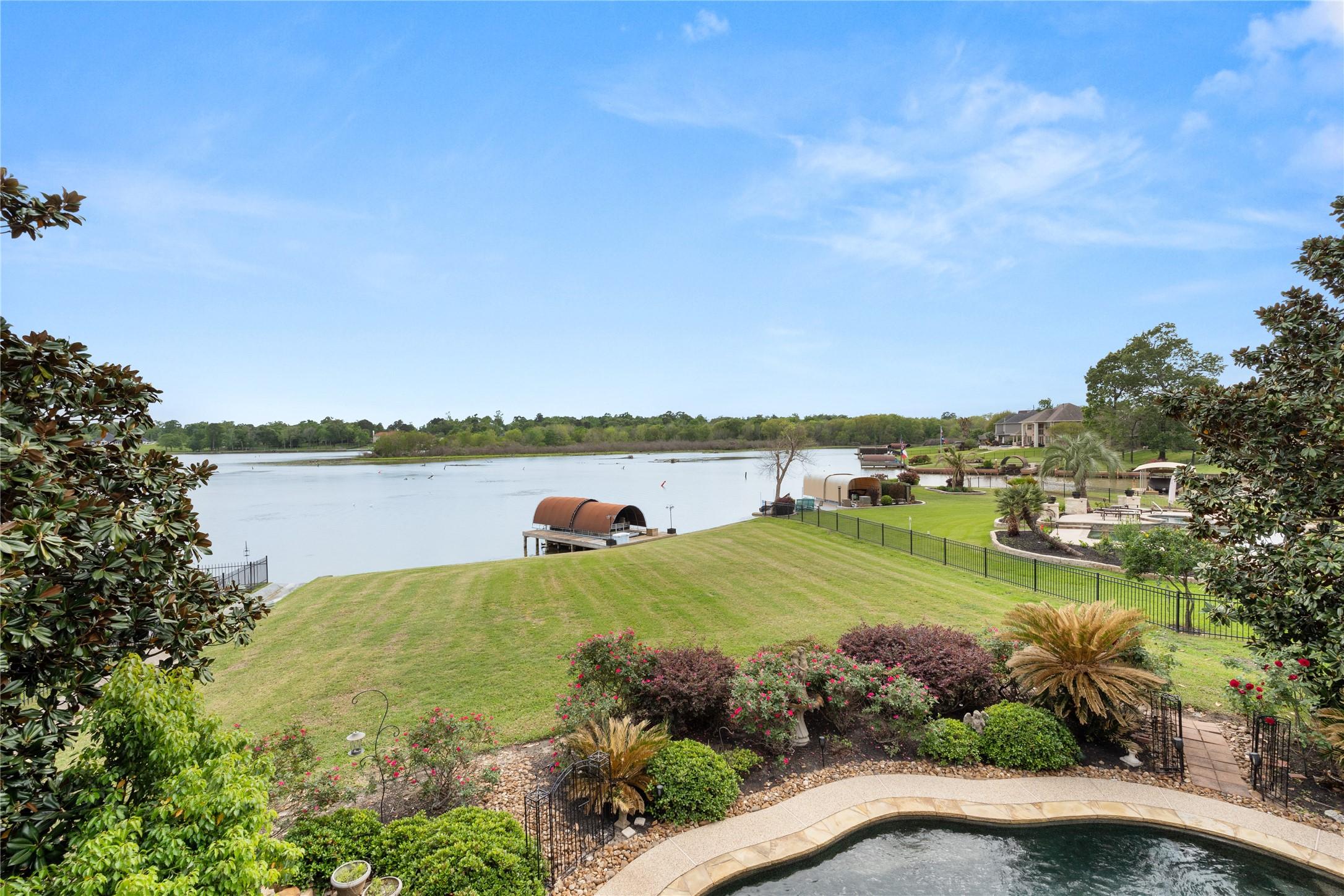 Image 1: Serene lakeside property with a spacious, manicure