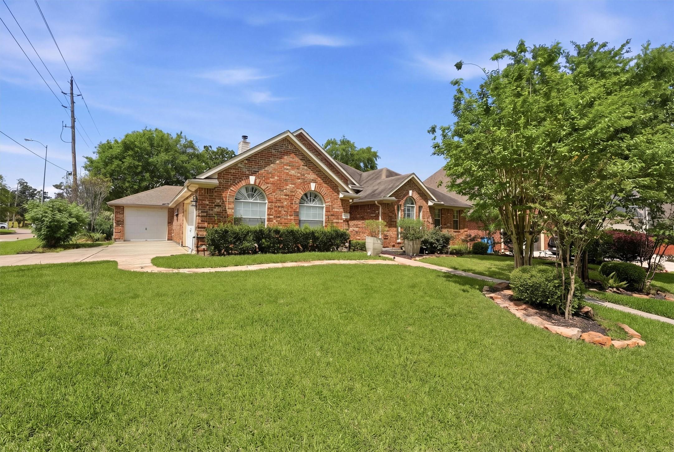 Image 2: Prime corner lot offering expansive outdoor space