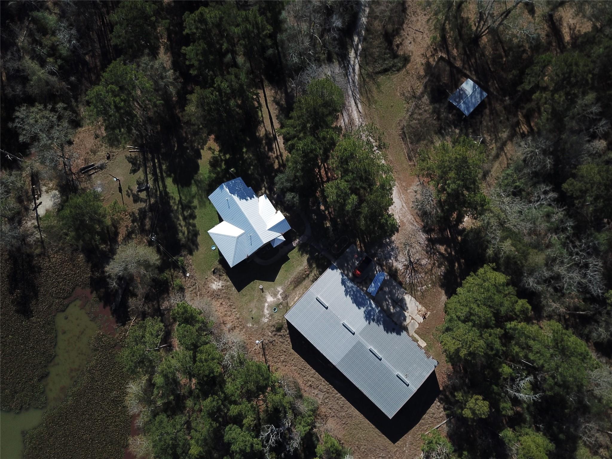 Image 2: = 3,000 sq ft house and 5000 sq ft Mueller Buildin