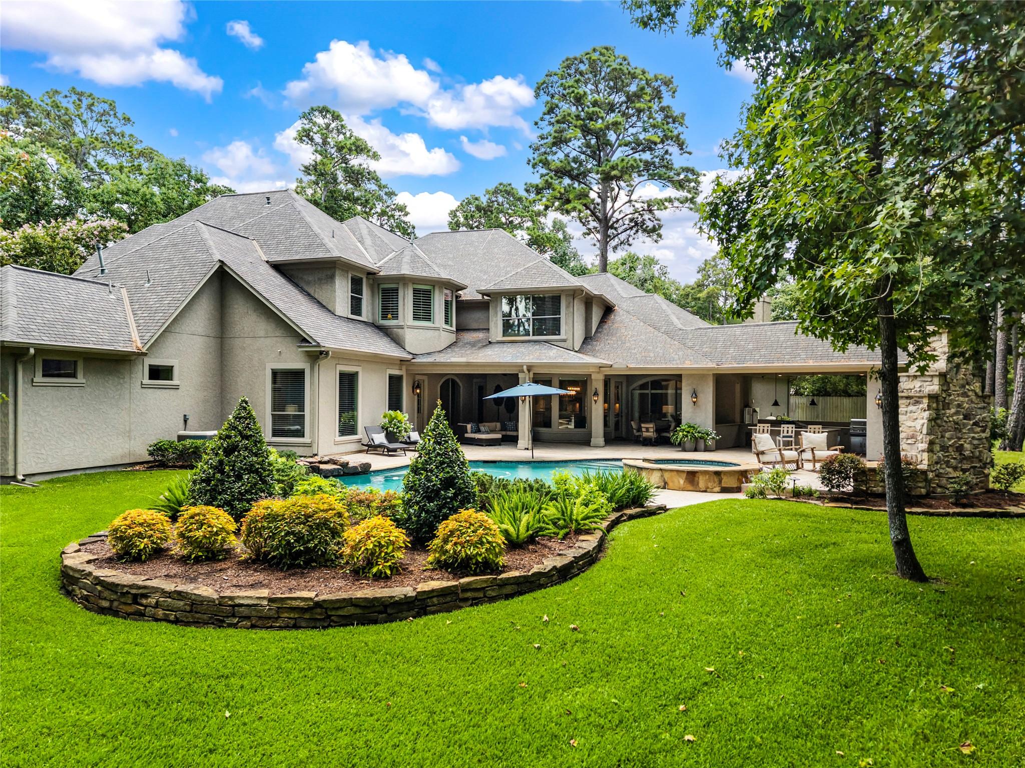 Image 4: The fully fenced backyard offers your own private