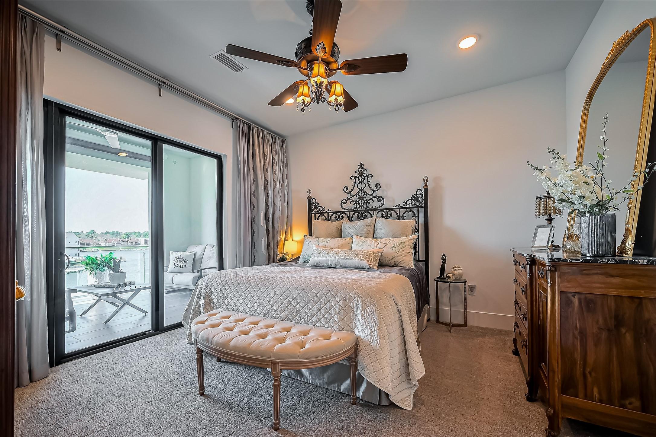 Image 1: The primary suite offers unparalleled comfort and