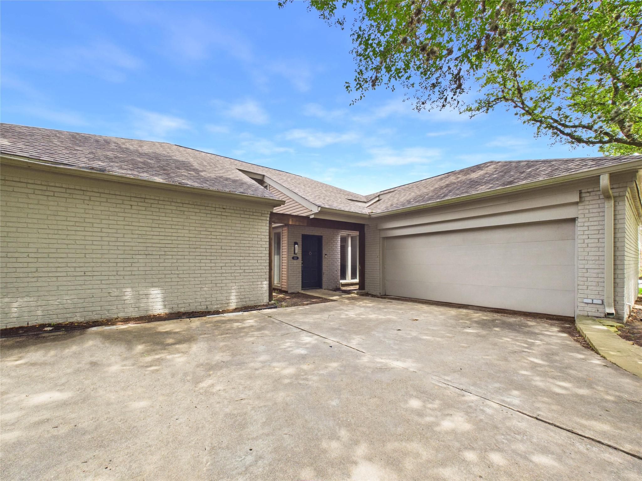Image 3: 1.5 story with 2 car garage