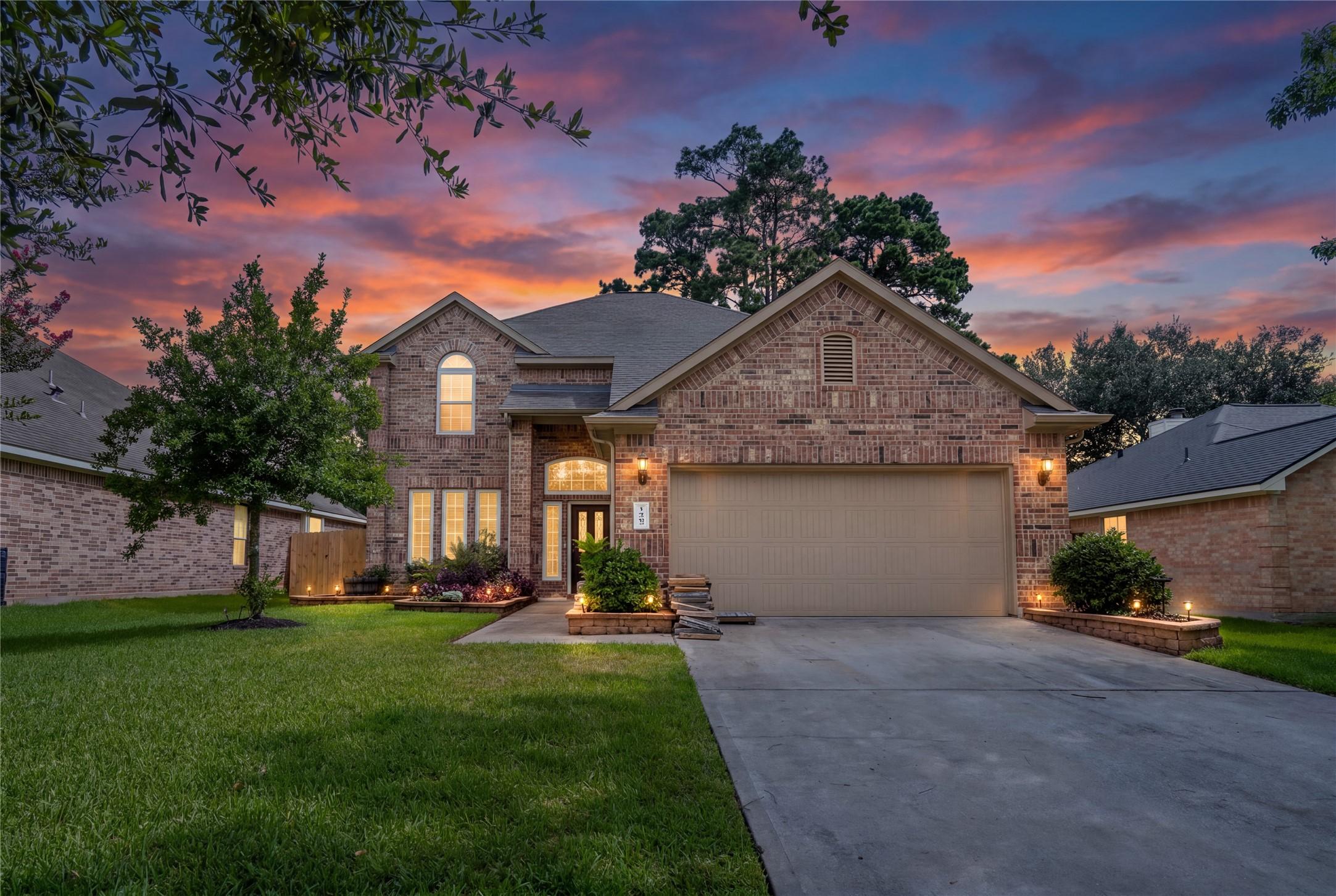 Image 2: Front exterior twilight.