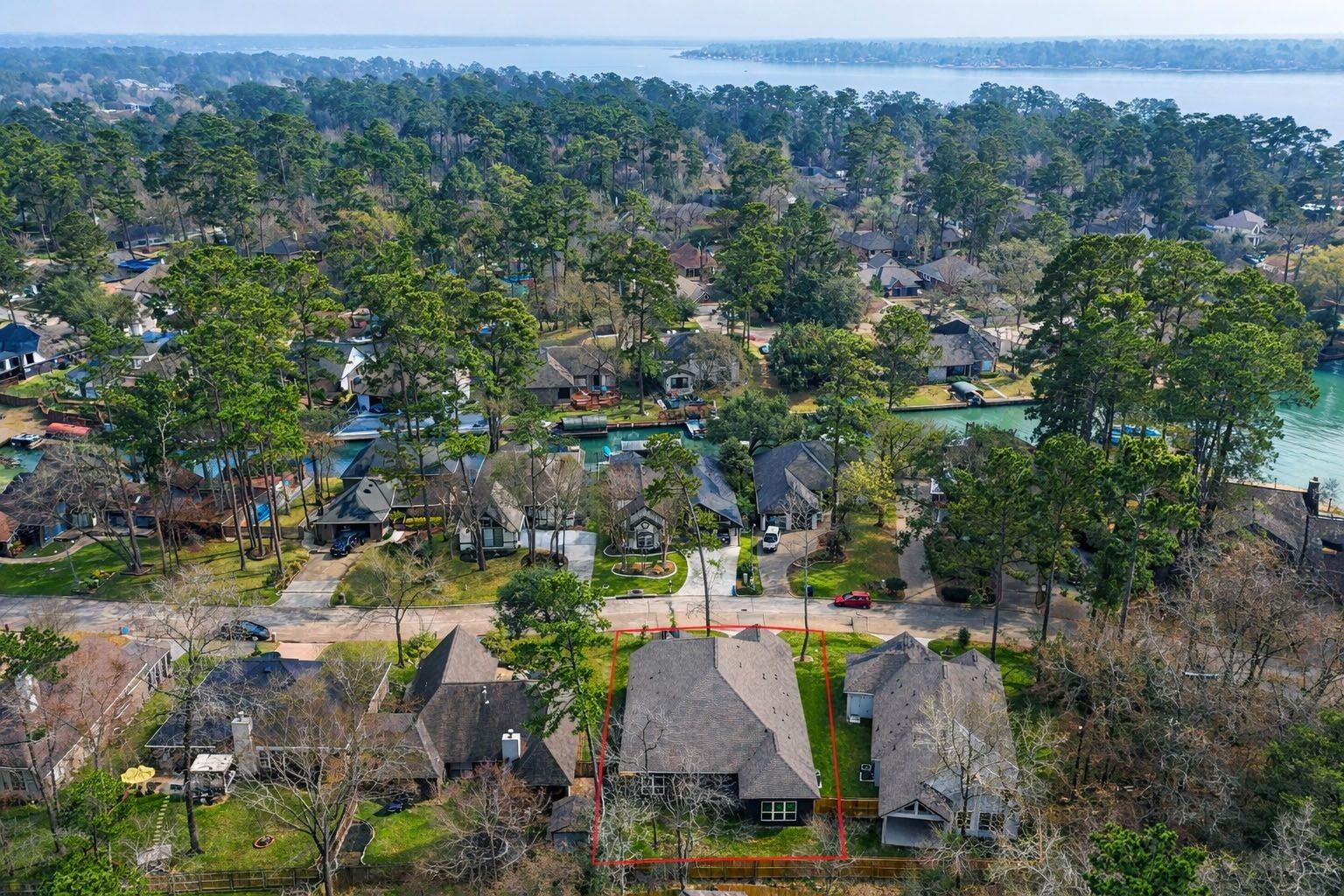 Image 2: The lots are to the rignt of the home in orange ac