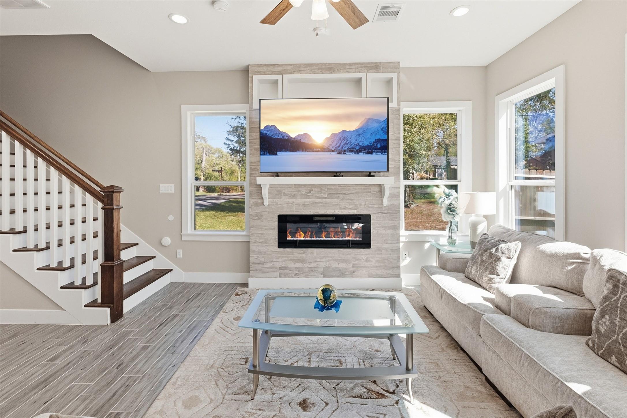 Image 4: The electric fireplace is a nice focal point.