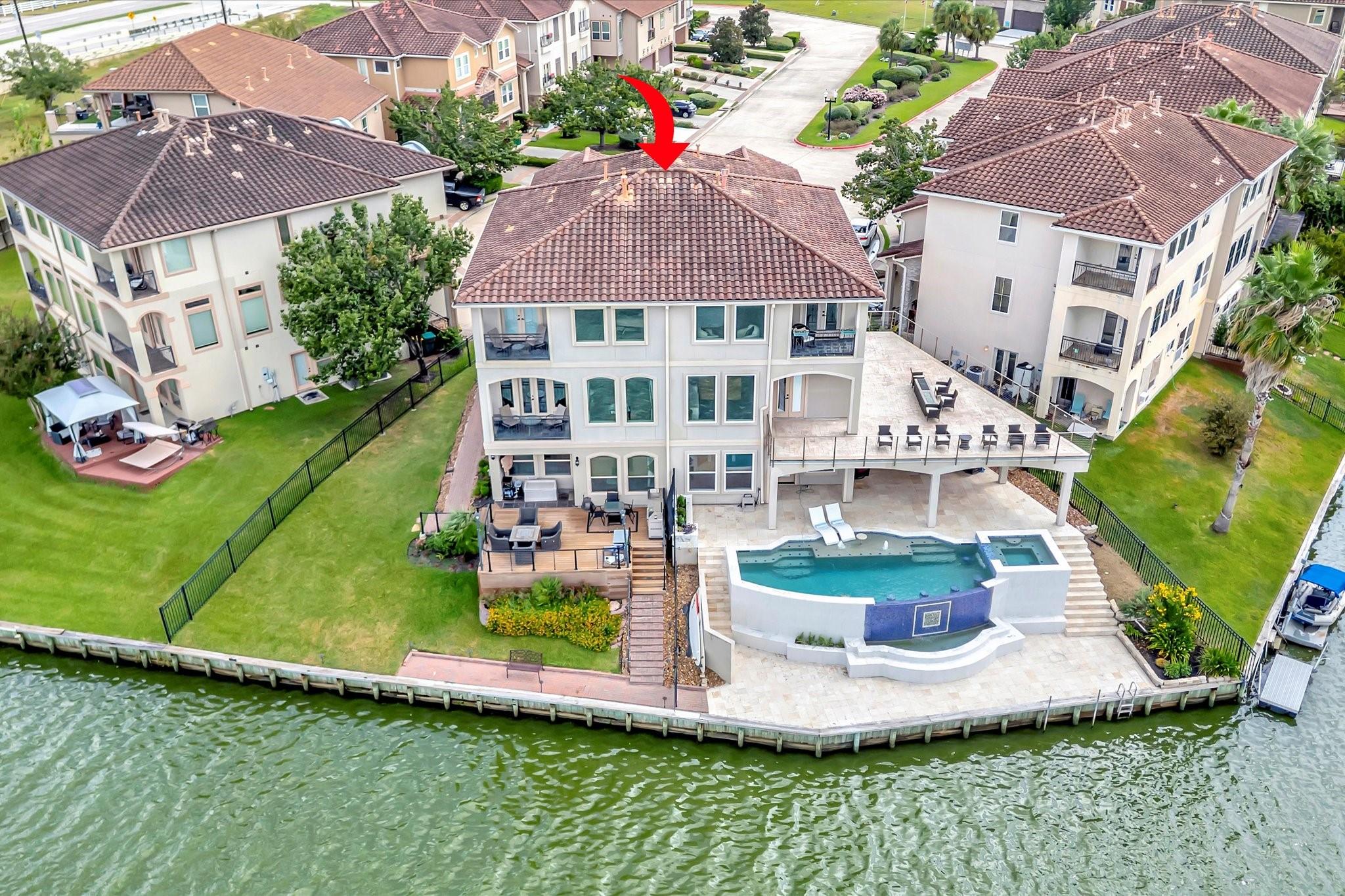 Image 2: Striking waterfront townhome with a private pool,