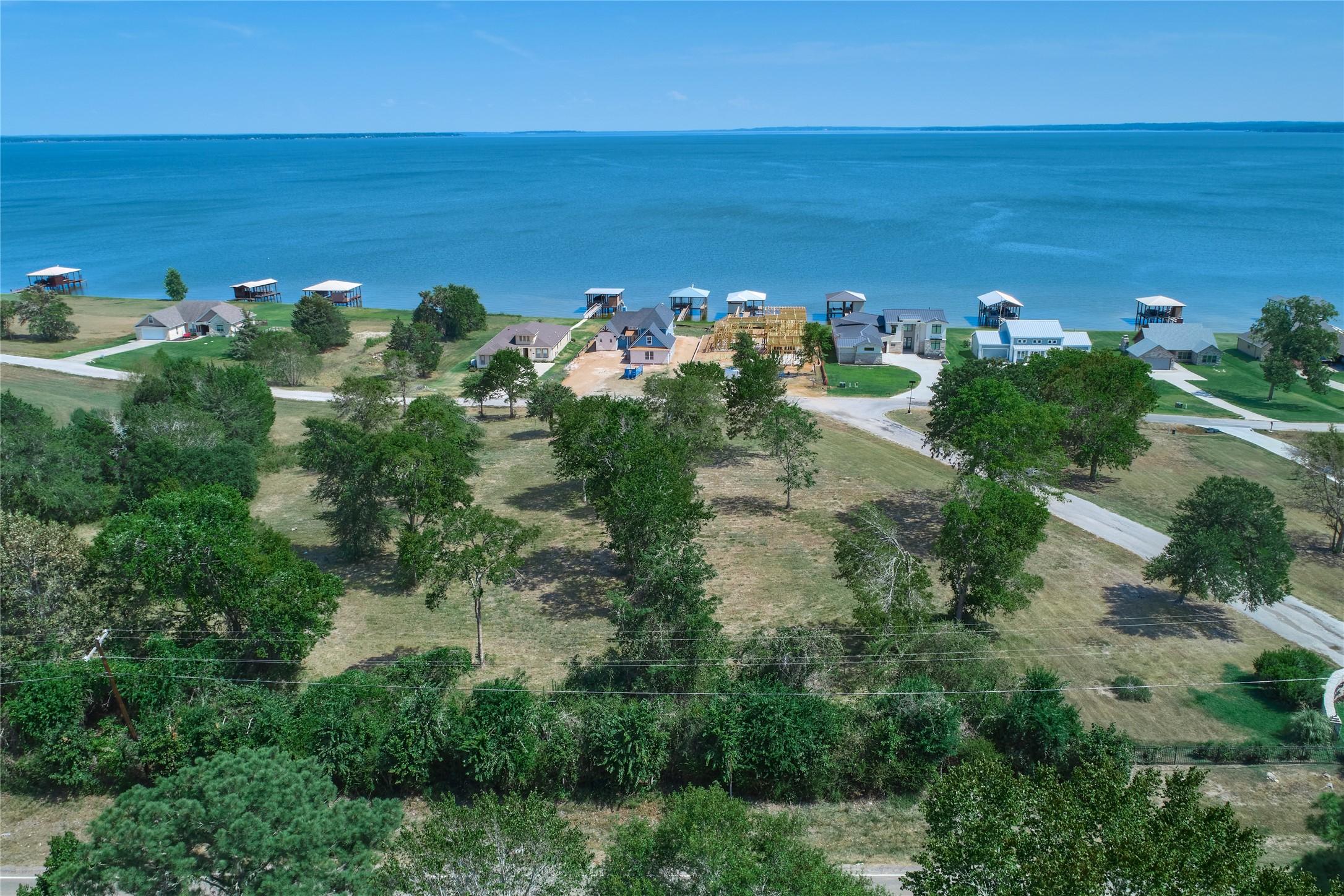Image 2: It is a huge lake view property composed of two lo