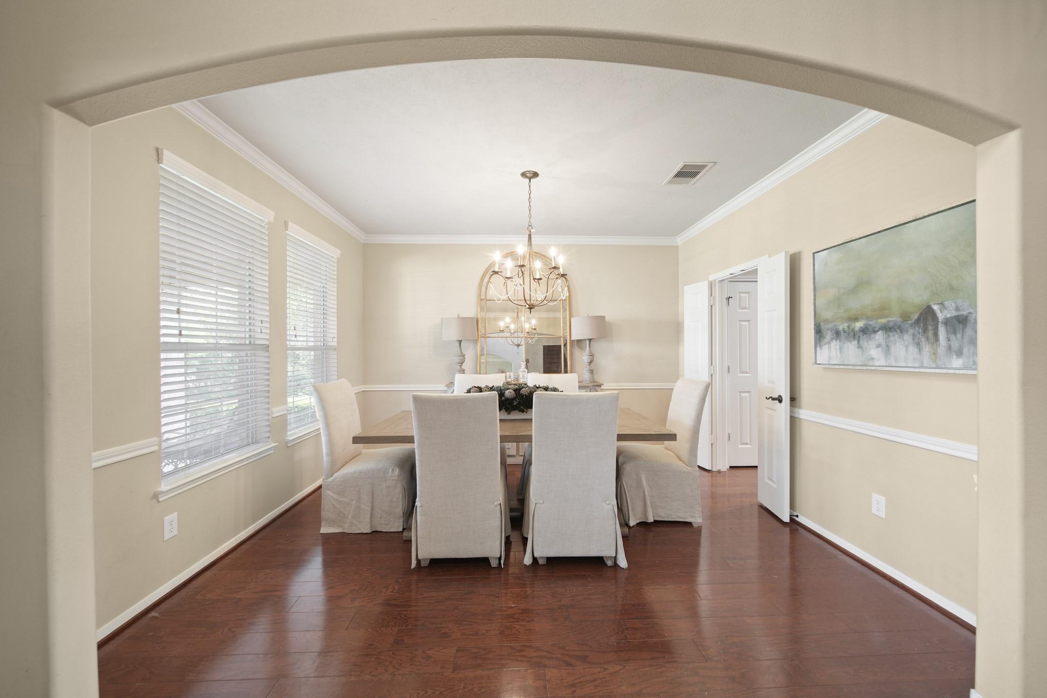 Image 4: Formal Dining off the left side entryway