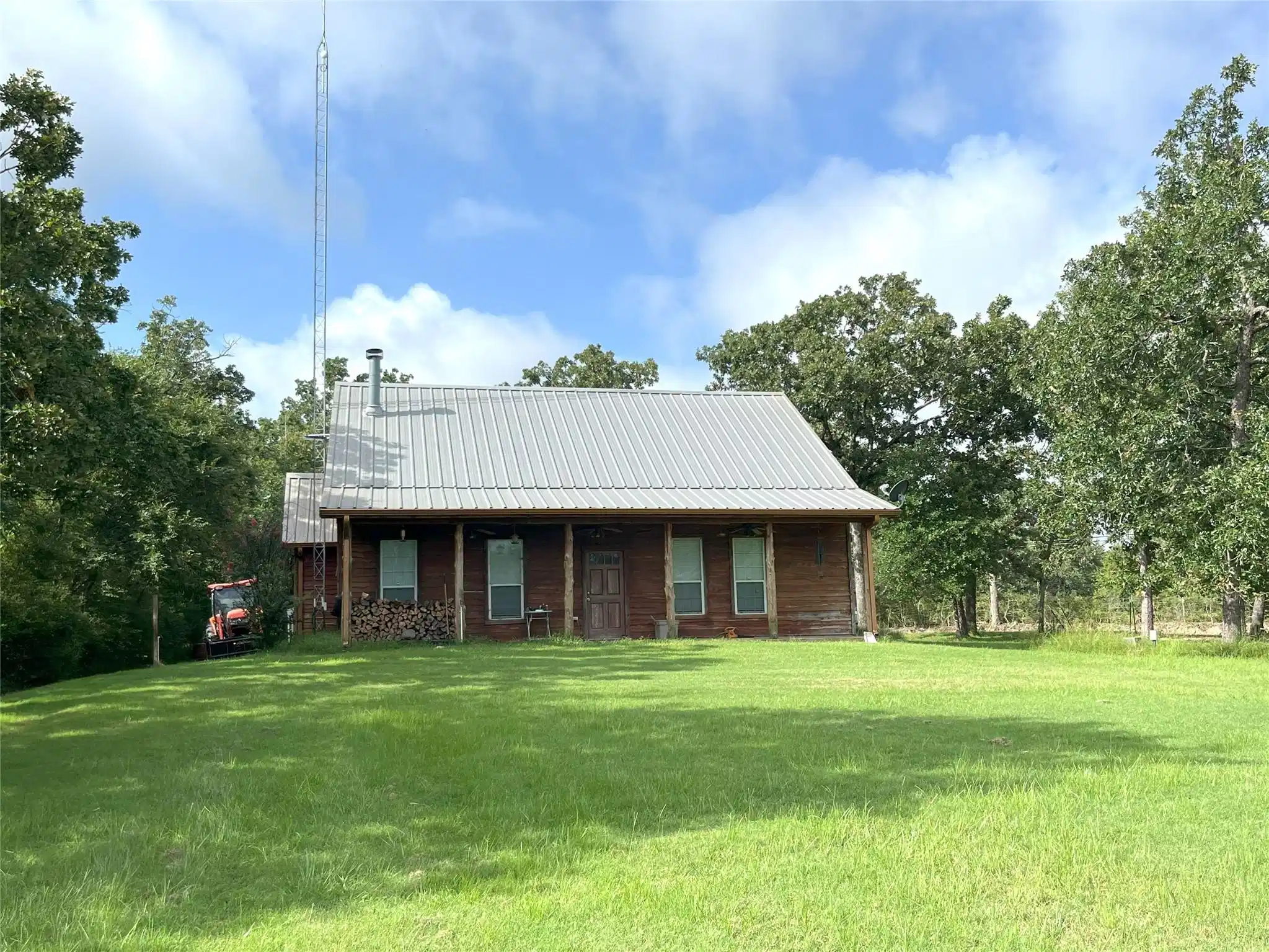 Image 1: Lakeside View of House