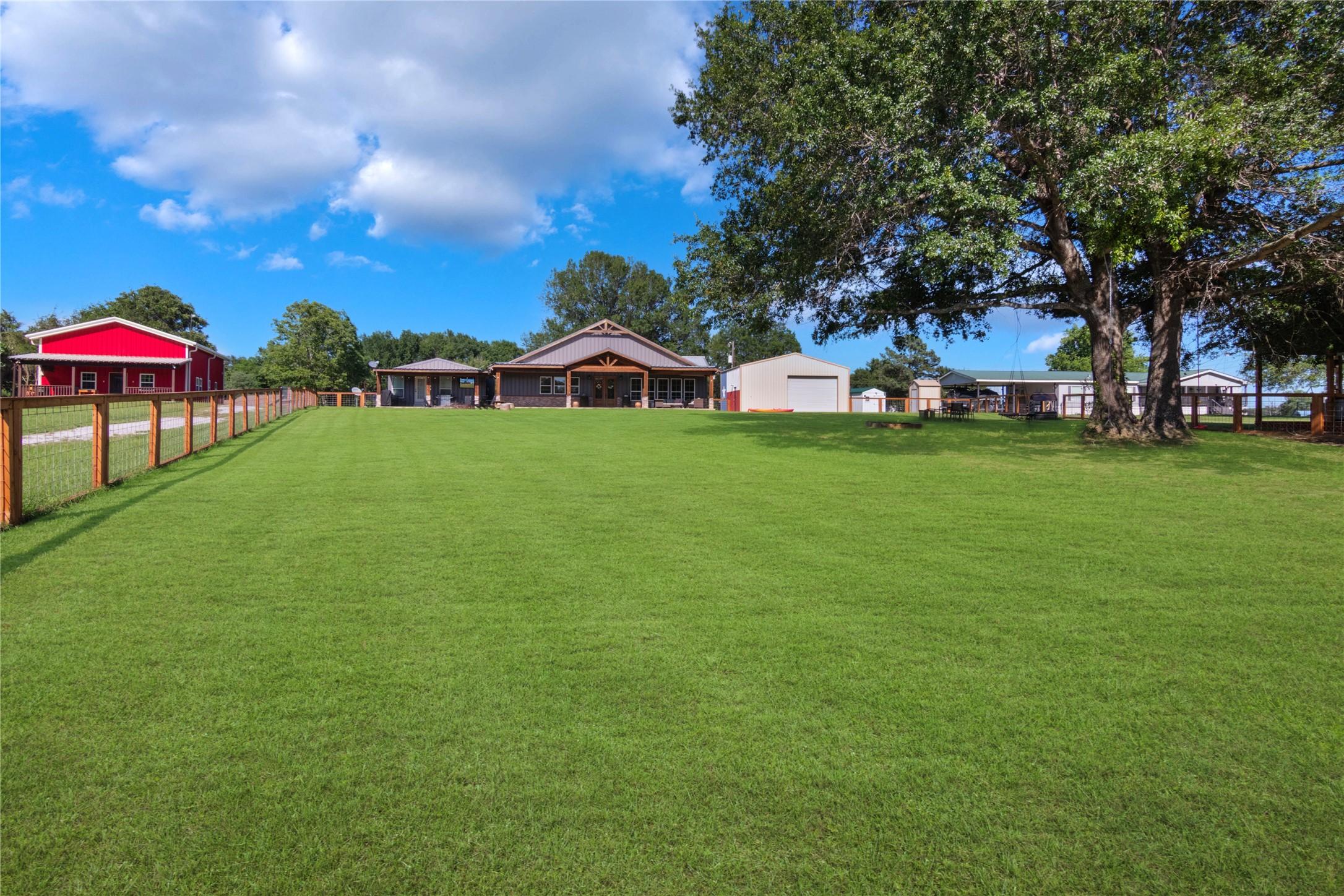 Image 3: Lake Side View of the Home.