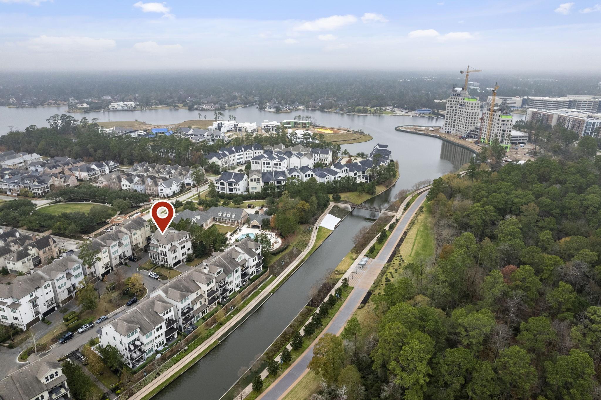 Image 3: Aerial perspective showcasing the townhome&rsquo;s premi