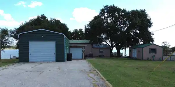 Image 4: View of Property from Road