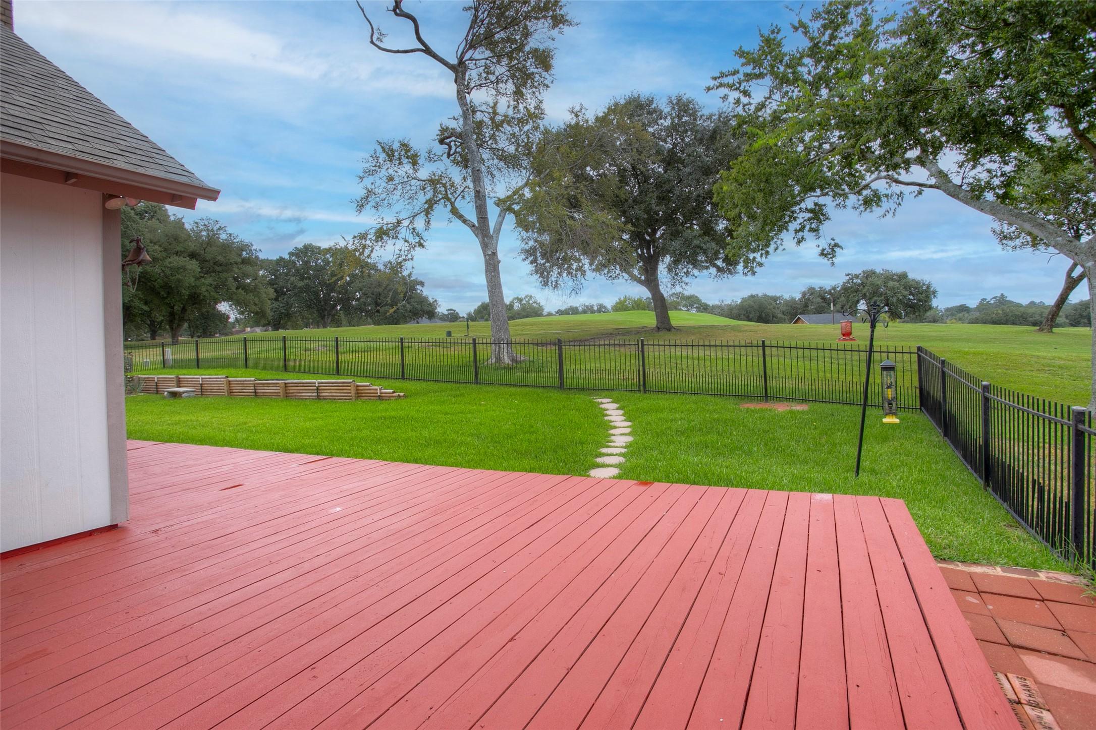 Image 3: Take a look at the backyard view!