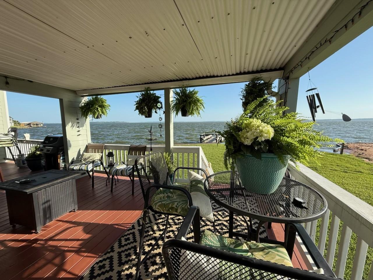 Image 1: Embrace waterfront living from this inviting cover