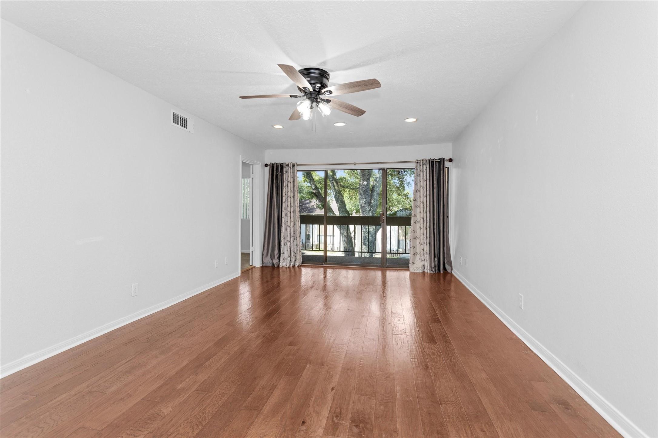Image 2: large living space- unstaged