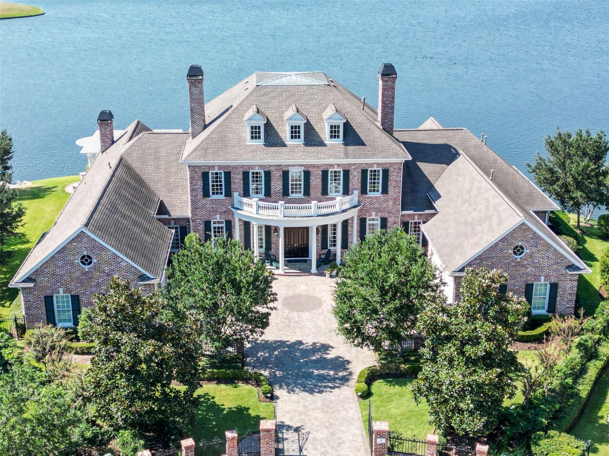 Image 1: Exquisite Robin Rueby waterfront home exemplifies