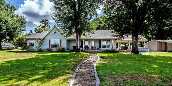 Image 2: View of back of home from lake