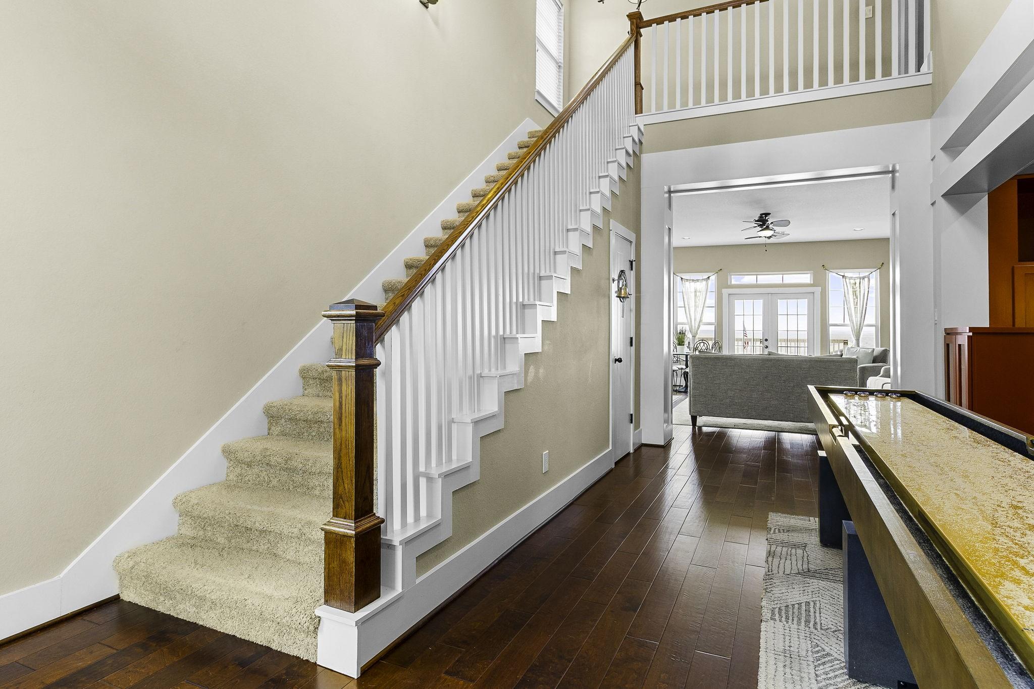 Image 3: Spacious foyer with 2 story ceilings