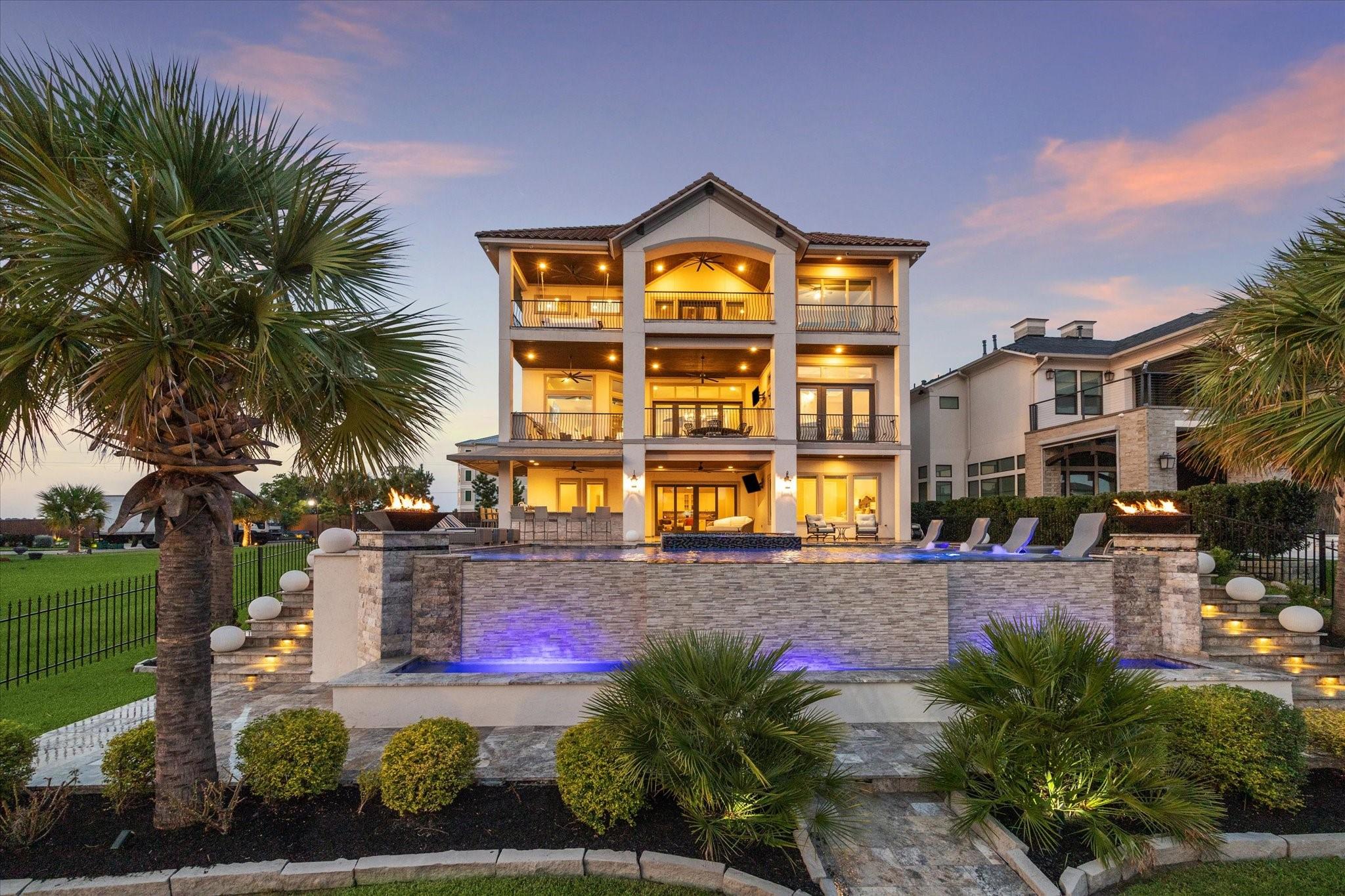 Image 1: Balcony on Each Level Overlooking Infinity Pool &