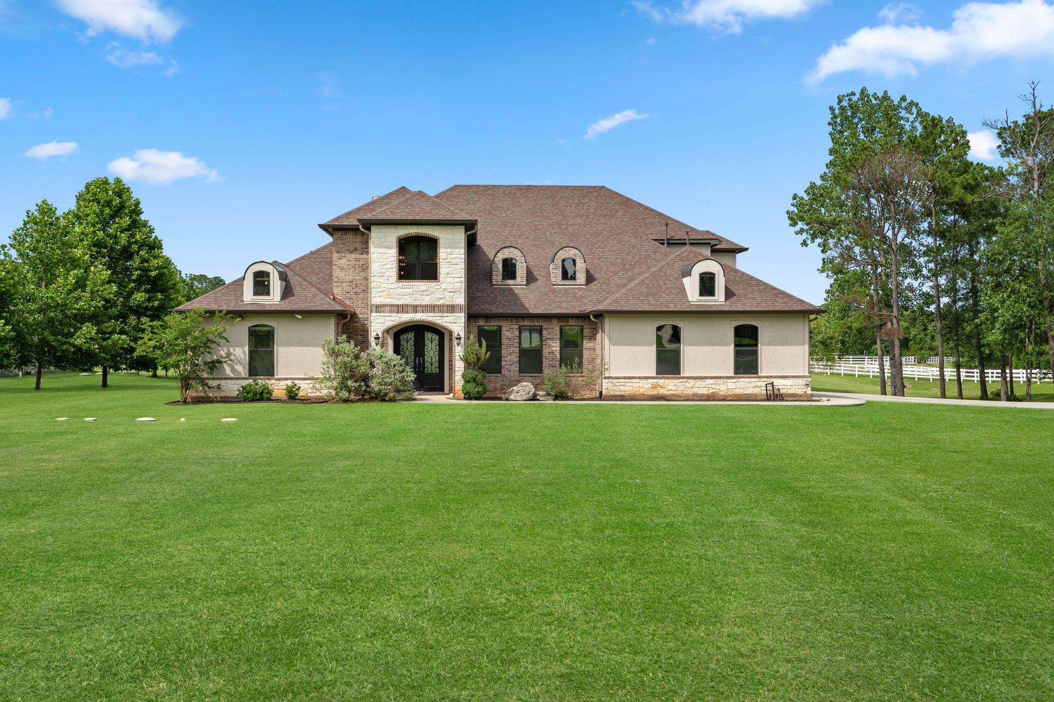 Image 1: Discover this stunning two-story home on an expans