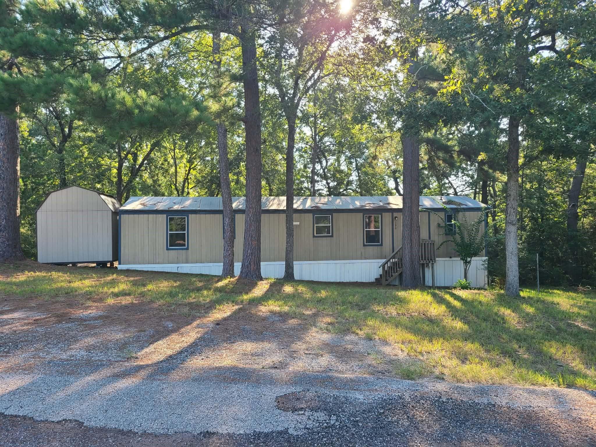 Image 2: Front of home and Property.