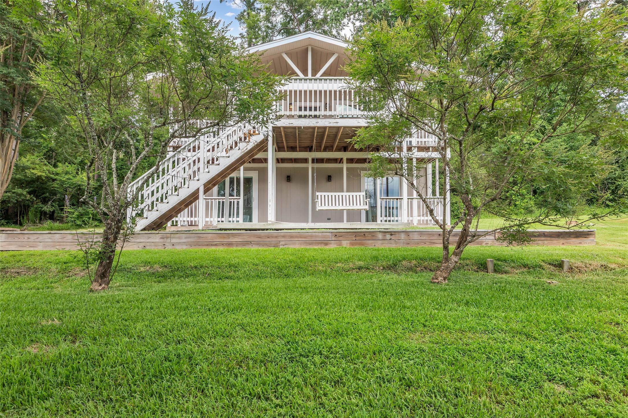 Image 4: Charming two-story home with a spacious balcony an
