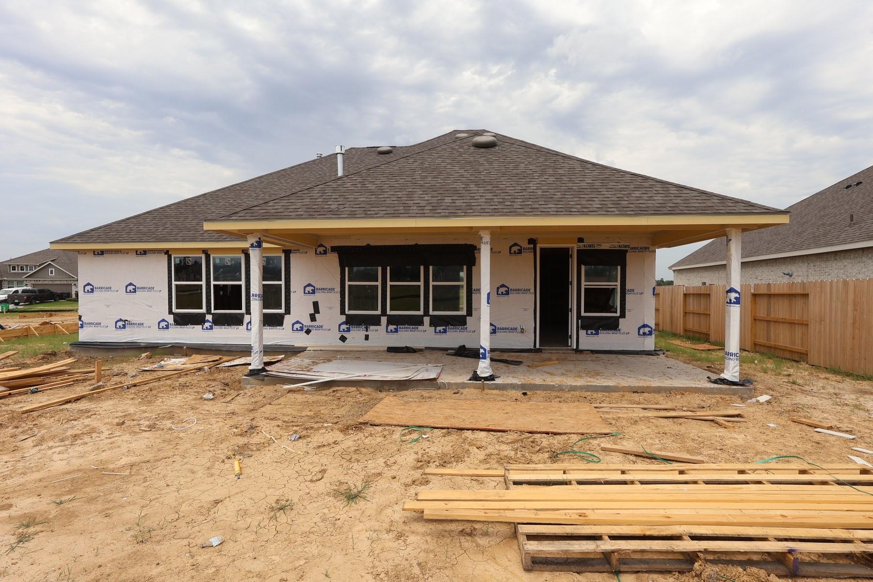 Image 4: Backyard with covered patio - still under construc