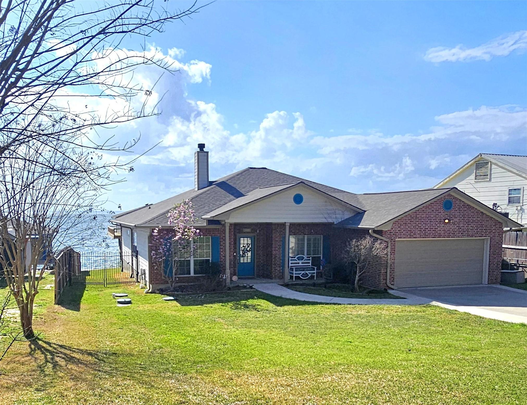 Image 3: Beautiful one story brick waterfront home just wai