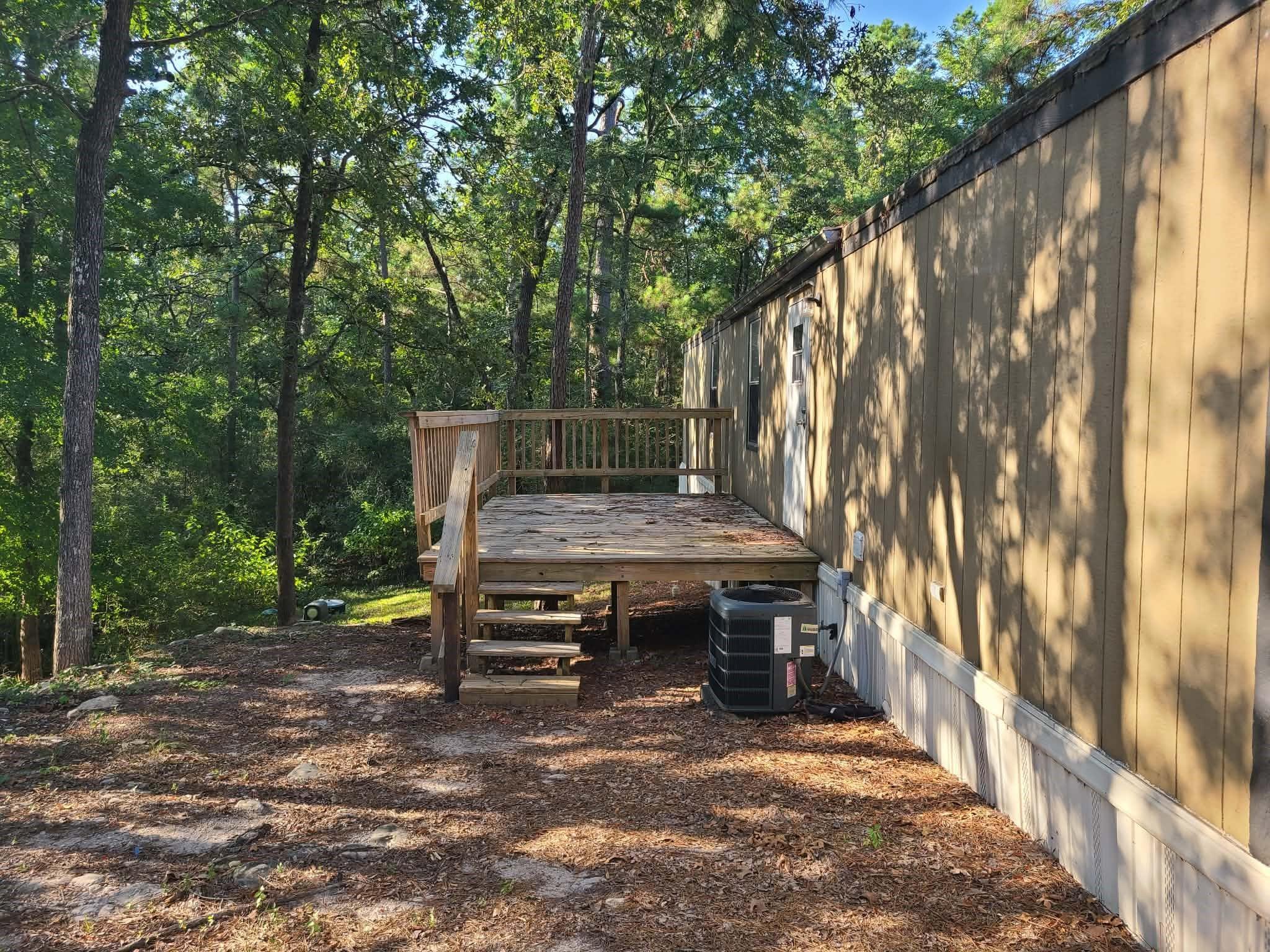 Image 3: Back Porch that leads into the back door.