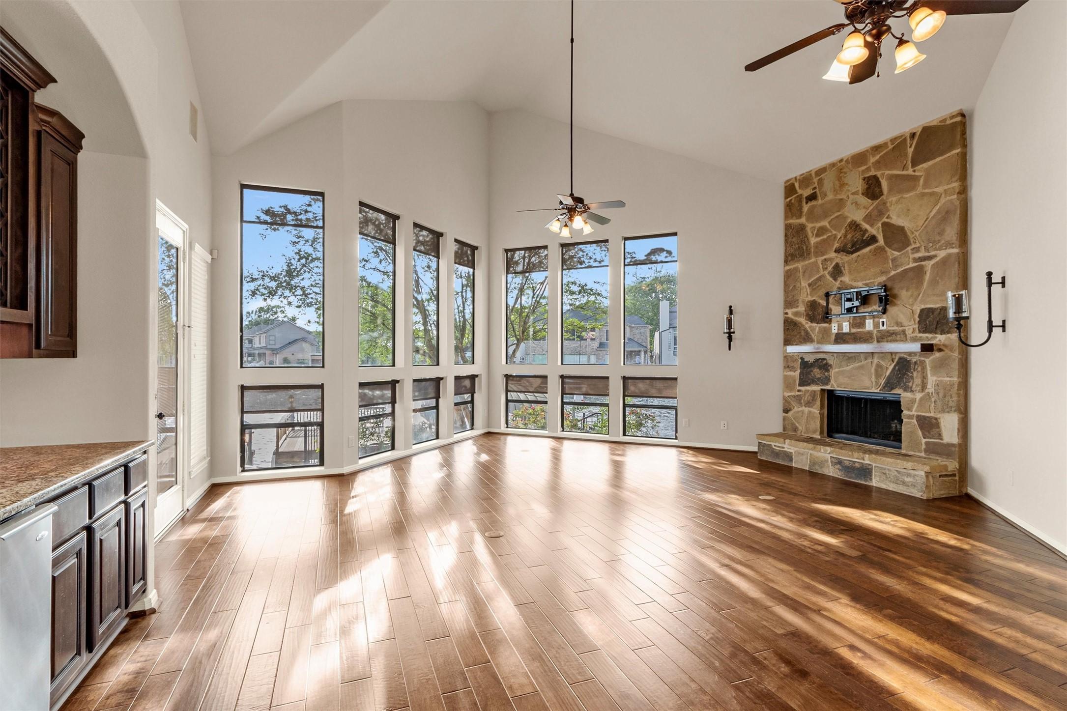 Image 3: Living area with a wall of windows to catch that b