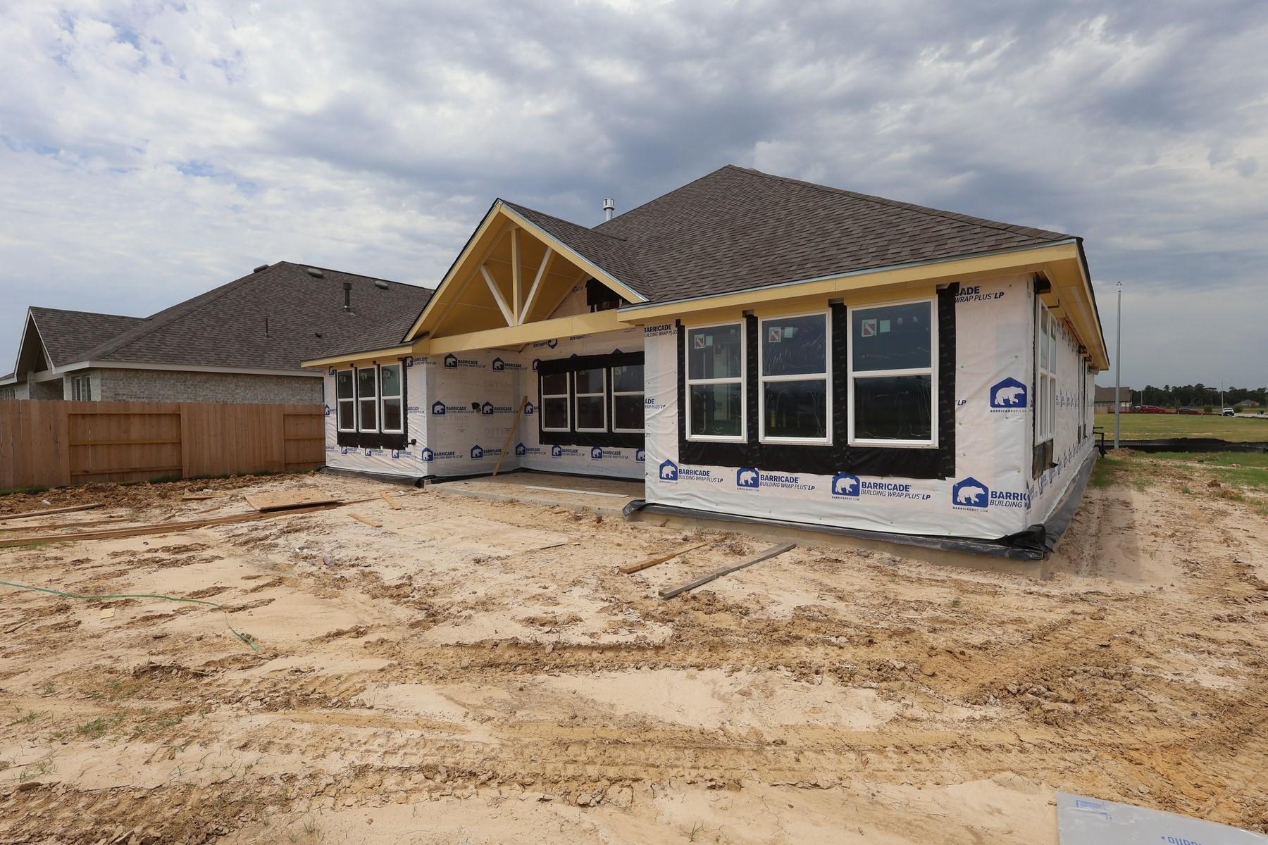 Image 4: Backyard with covered patio - still under construc