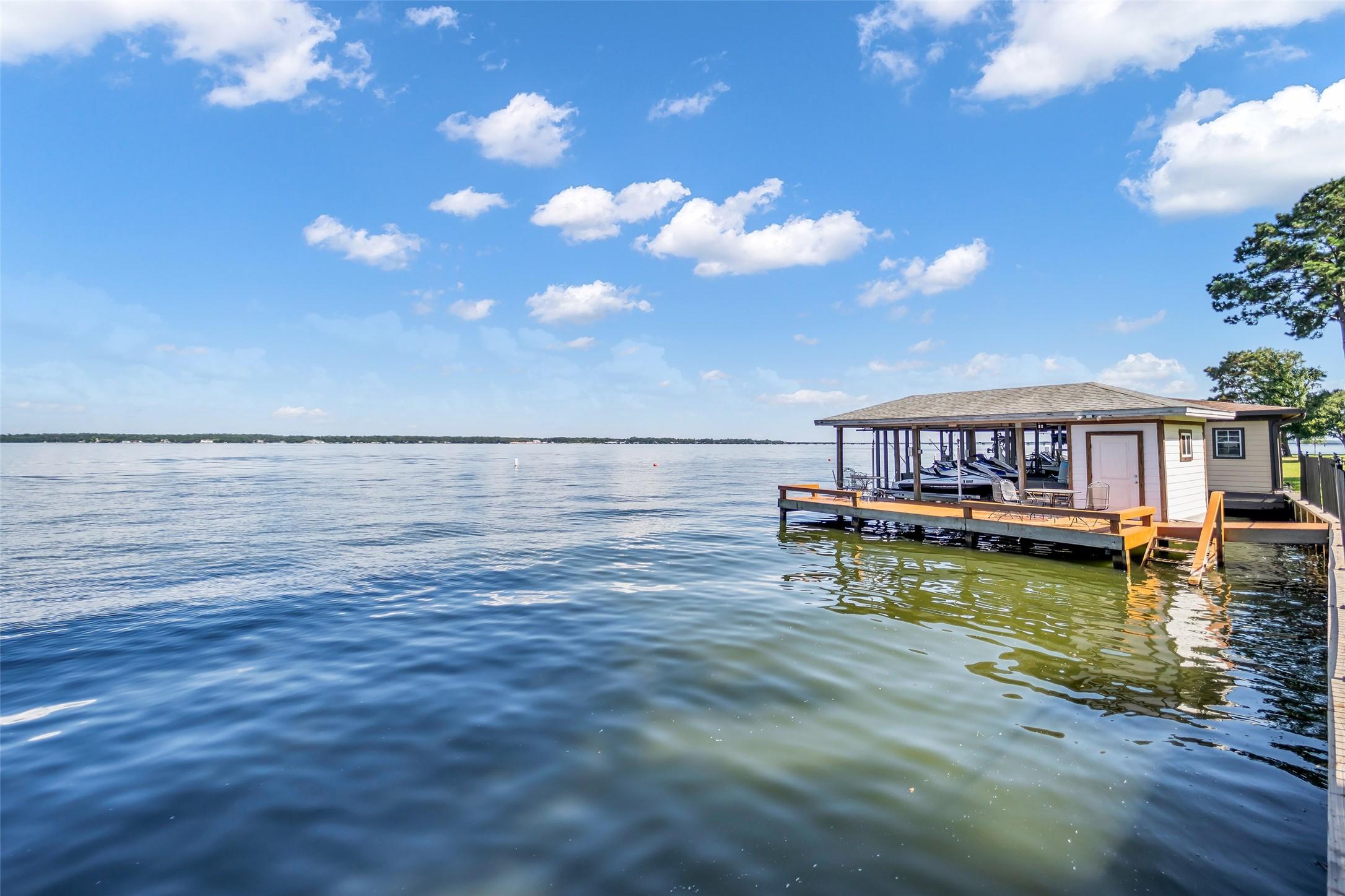 Image 1: Open Water views plus covered boat dock w storage!