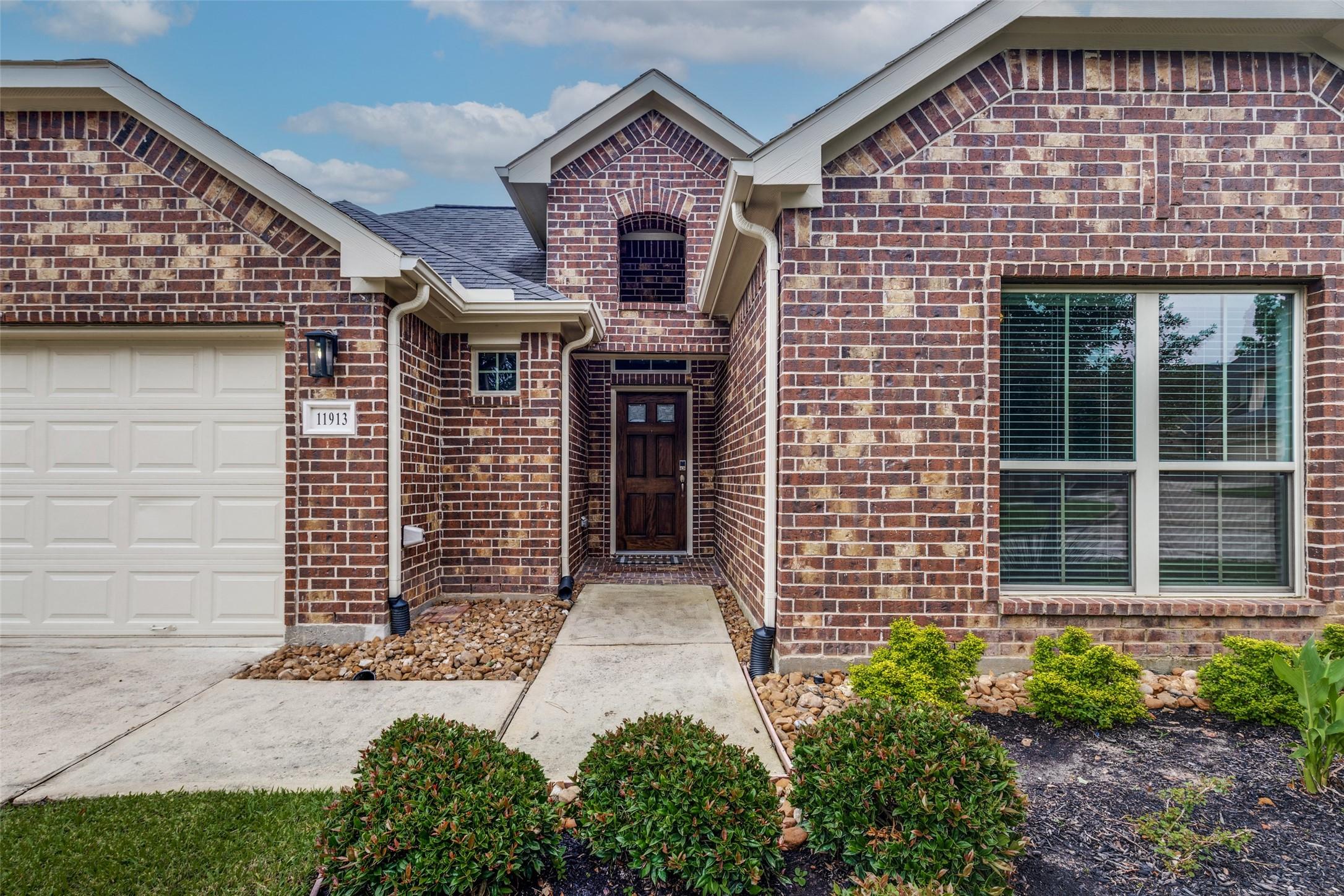 Image 2: Full brick home recently painted, has 2 covered pa