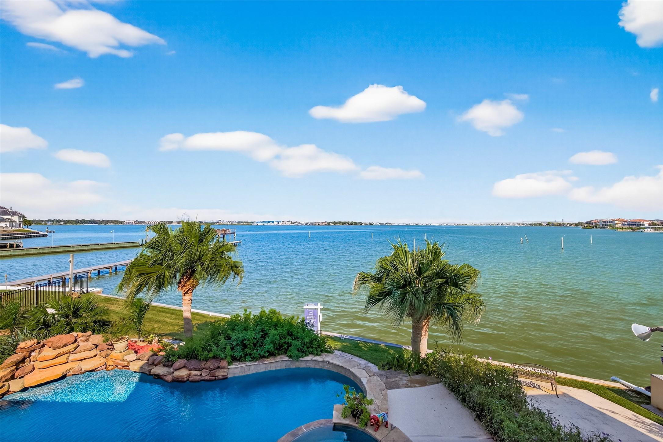 Image 1: View from primary bedroom balcony